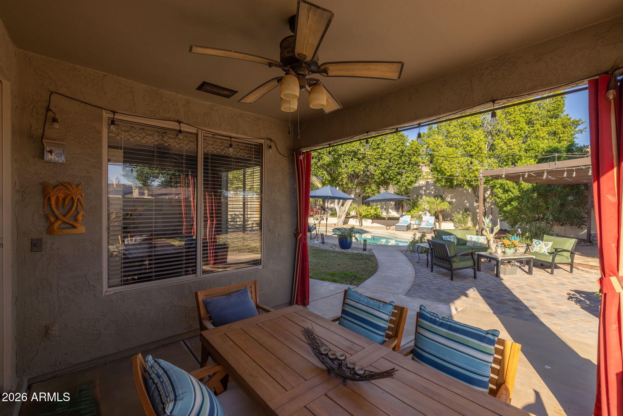 1622 West Nighthawk Way Phoenix, AZ 85045 - Photo 38 of 70 a living room with furniture and a window