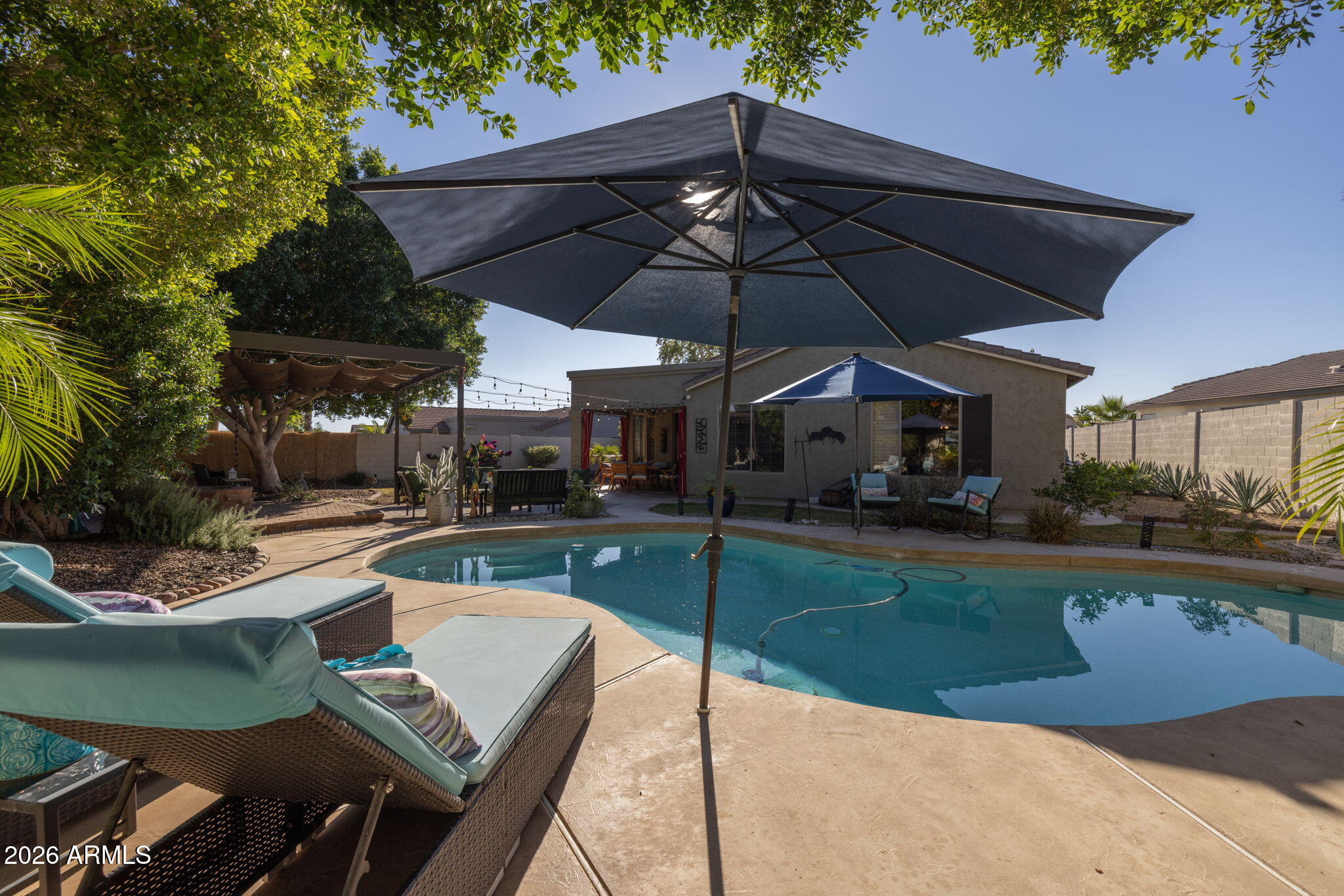 1622 West Nighthawk Way Phoenix, AZ 85045 - Photo 42 of 70 a view of a backyard with sitting area