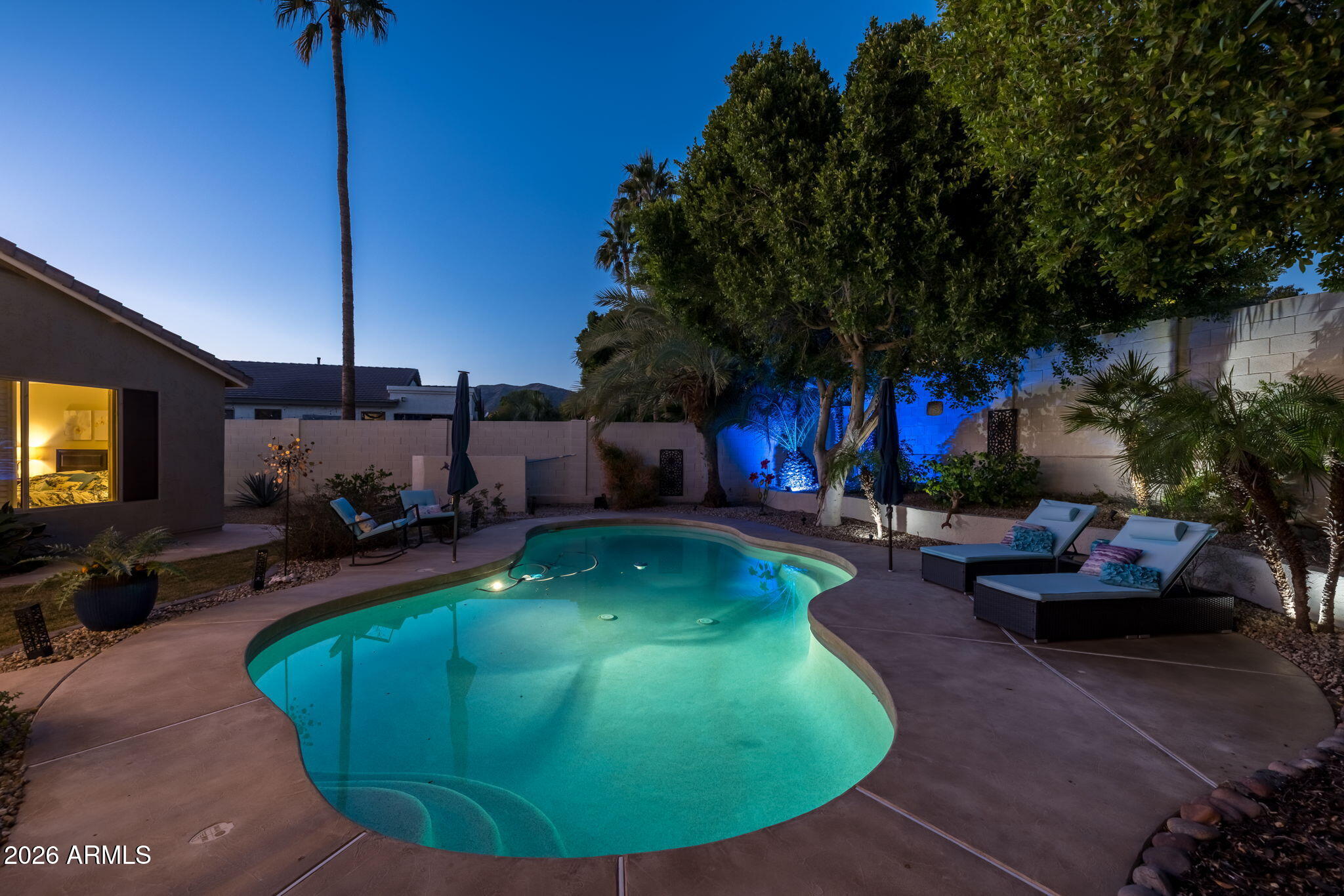 1622 West Nighthawk Way Phoenix, AZ 85045 - Photo 50 of 70 a view of a swimming pool with a patio