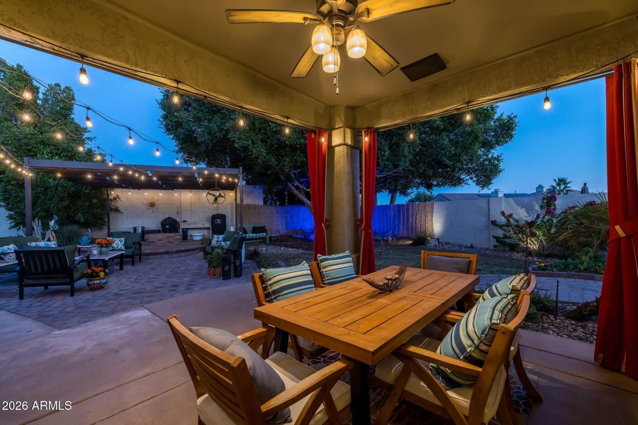 1622 West Nighthawk Way Phoenix, AZ 85045 - Photo 52 of 70 a patio with a table and chairs and a barbeque