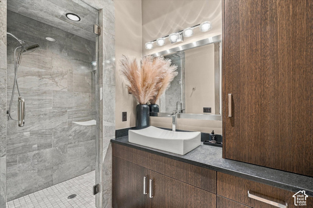 5936 Triple Crown Trail Oakley, UT 84055 - Photo 23 of 57 Glass-enclosed shower with large-format stone-finish tiling