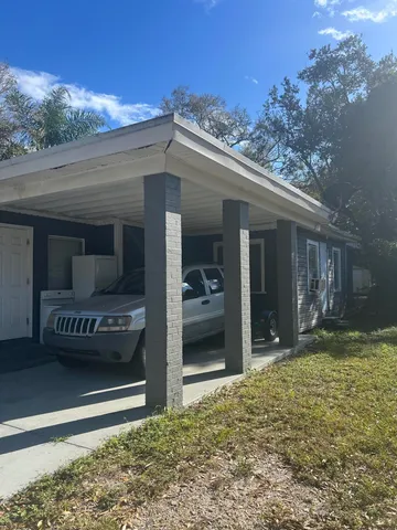 a view of a house with a porch
