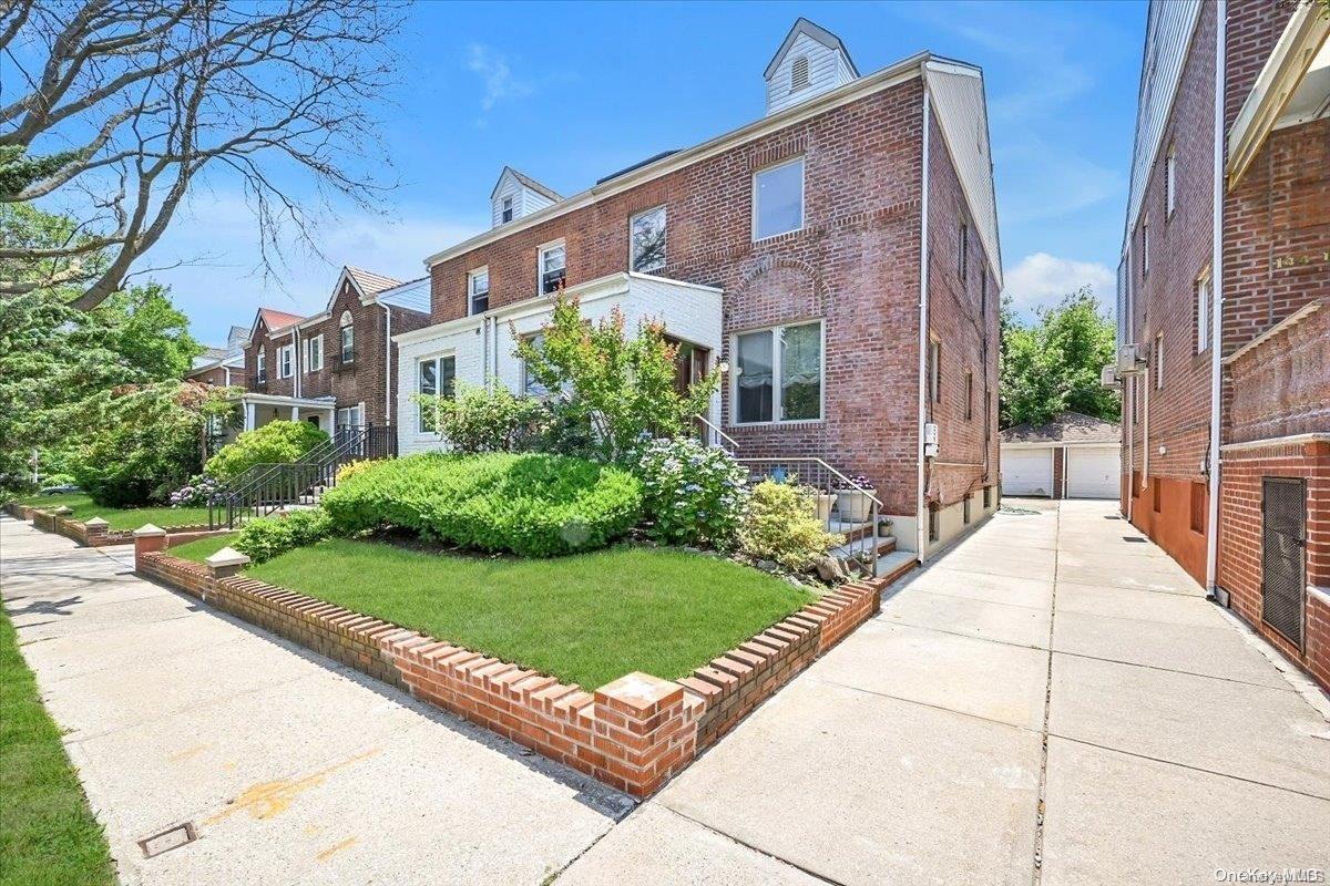 a view of a building with a yard
