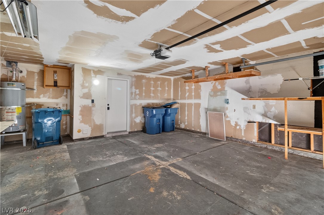 3156 Terrace View Drive Laughlin, NV 89029 - Photo 49 of 94 Functional garage with ample space and overhead storage solutions.