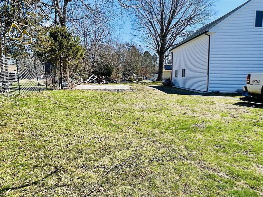 92 Mill Street Lancaster, MA 01523 - Photo 22 of 26 a view of open space with garden
