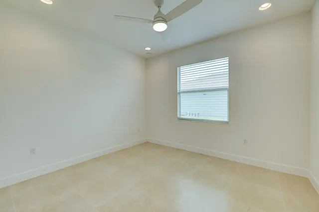 a view of a lake with a building in the background