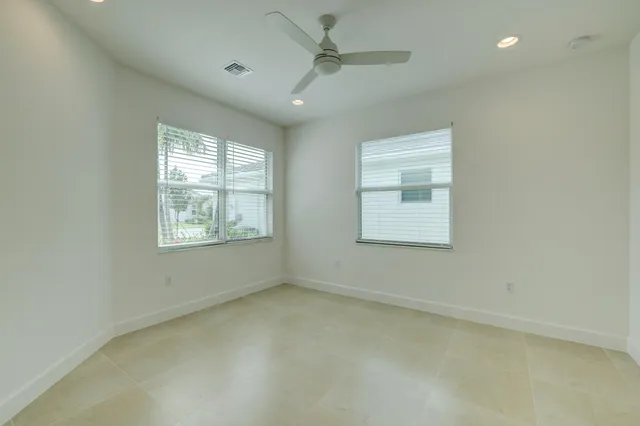 a view of a swimming pool with a terrace