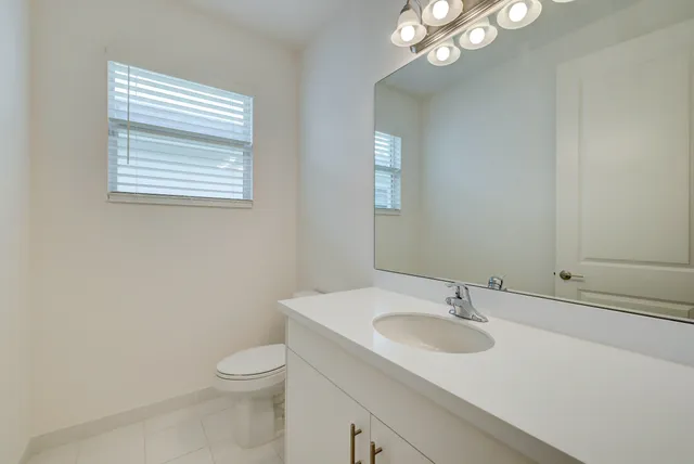 a view of a backyard with furniture