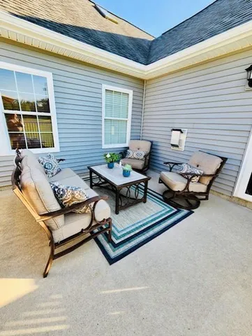 a outdoor living space with furniture