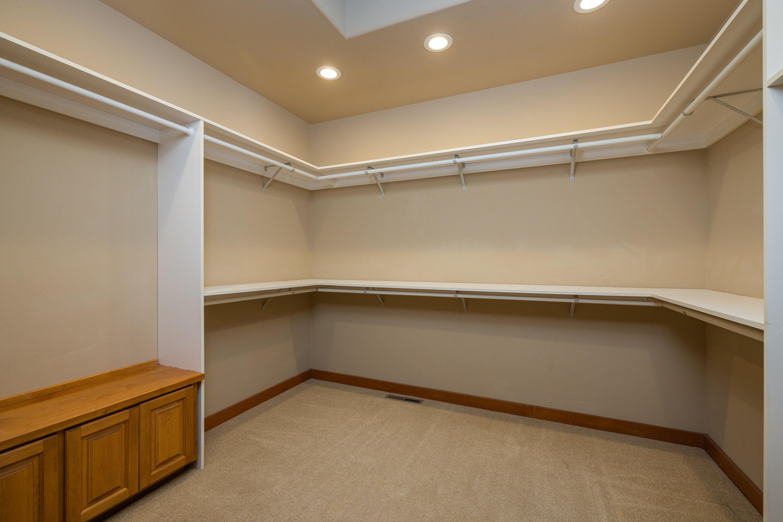 70331 Willow Herb, Unit GM205 Black Butte Ranch, OR 97759 - Photo 49 of 75 Large walk-in Closet with organizer shelving, skylight and built-in bench