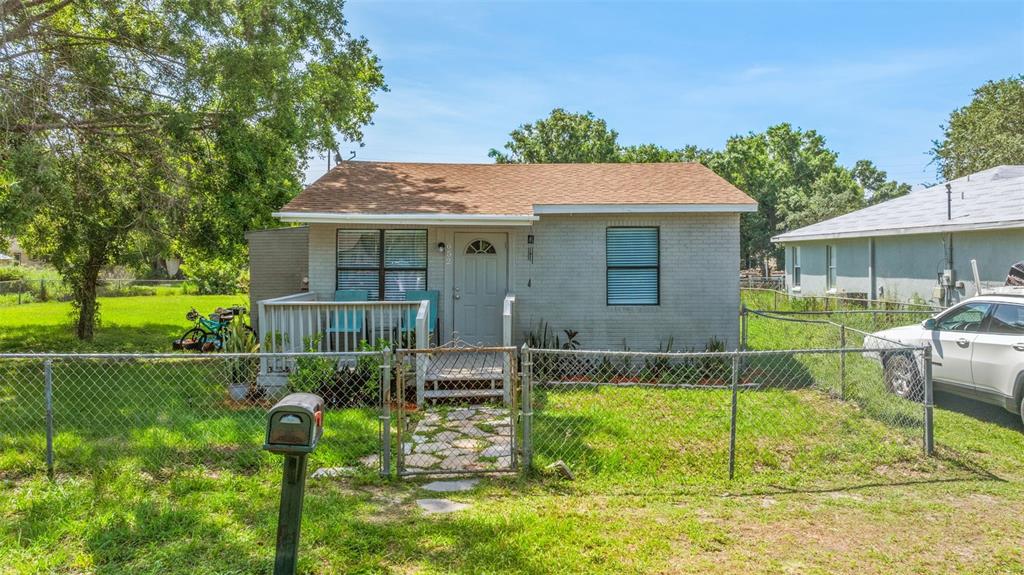 652 North Jackson Street Eagle Lake, FL 33839 - Photo 24 of 30 a view of house with backyard