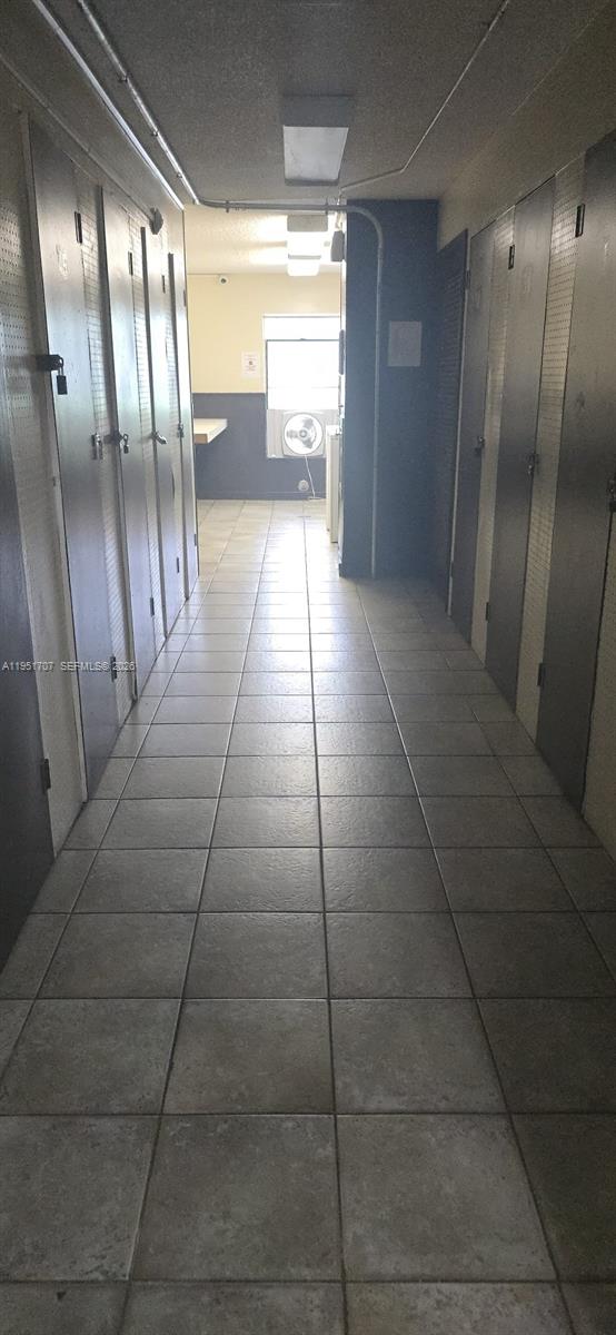 3680 Inverrary Drive, Unit 3M Lauderhill, FL 33319 - Photo 23 of 60 a bathroom with a glass door shower