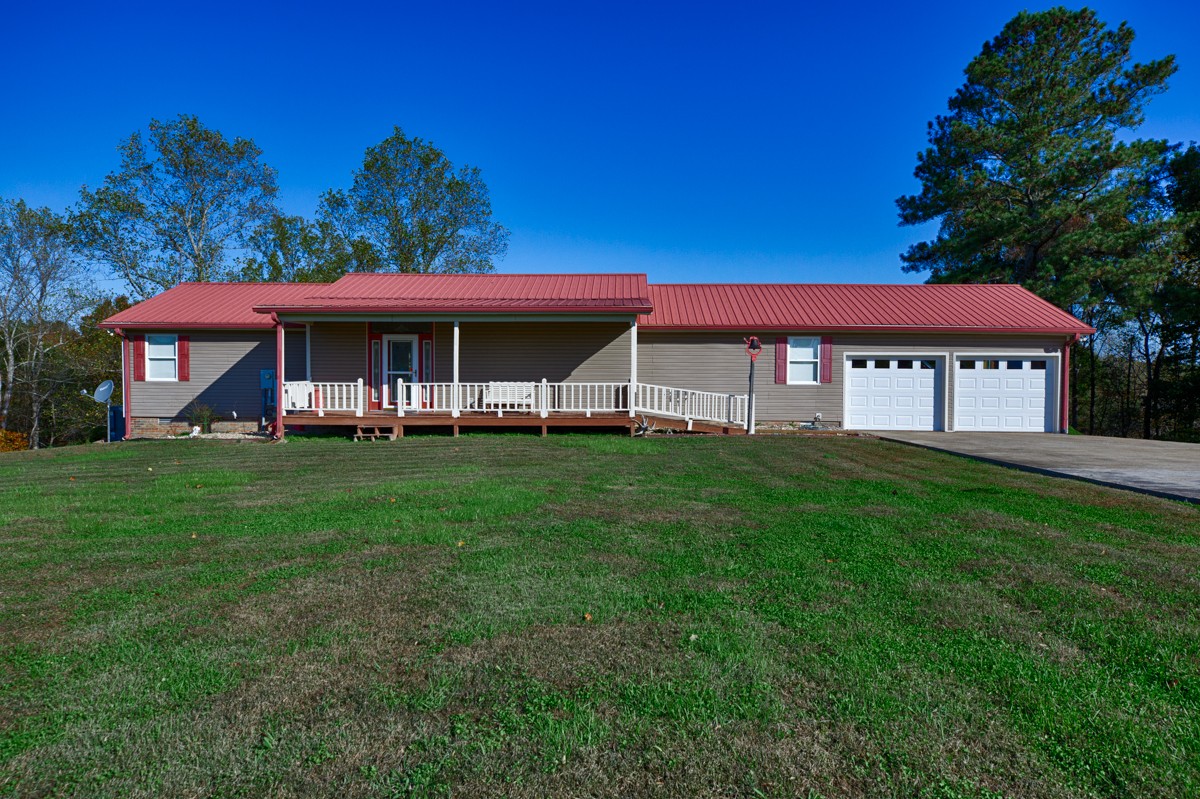 1997 Nancy Green Ridge Road Prospect, TN 38477 - Photo 2 of 25 a view of a house with a big yard