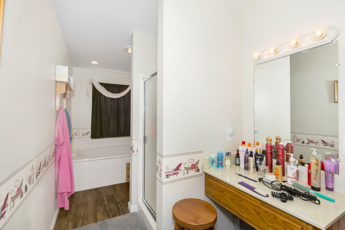 1997 Nancy Green Ridge Road Prospect, TN 38477 - Photo 15 of 25 a bathroom with a sink vanity mirror and toilet
