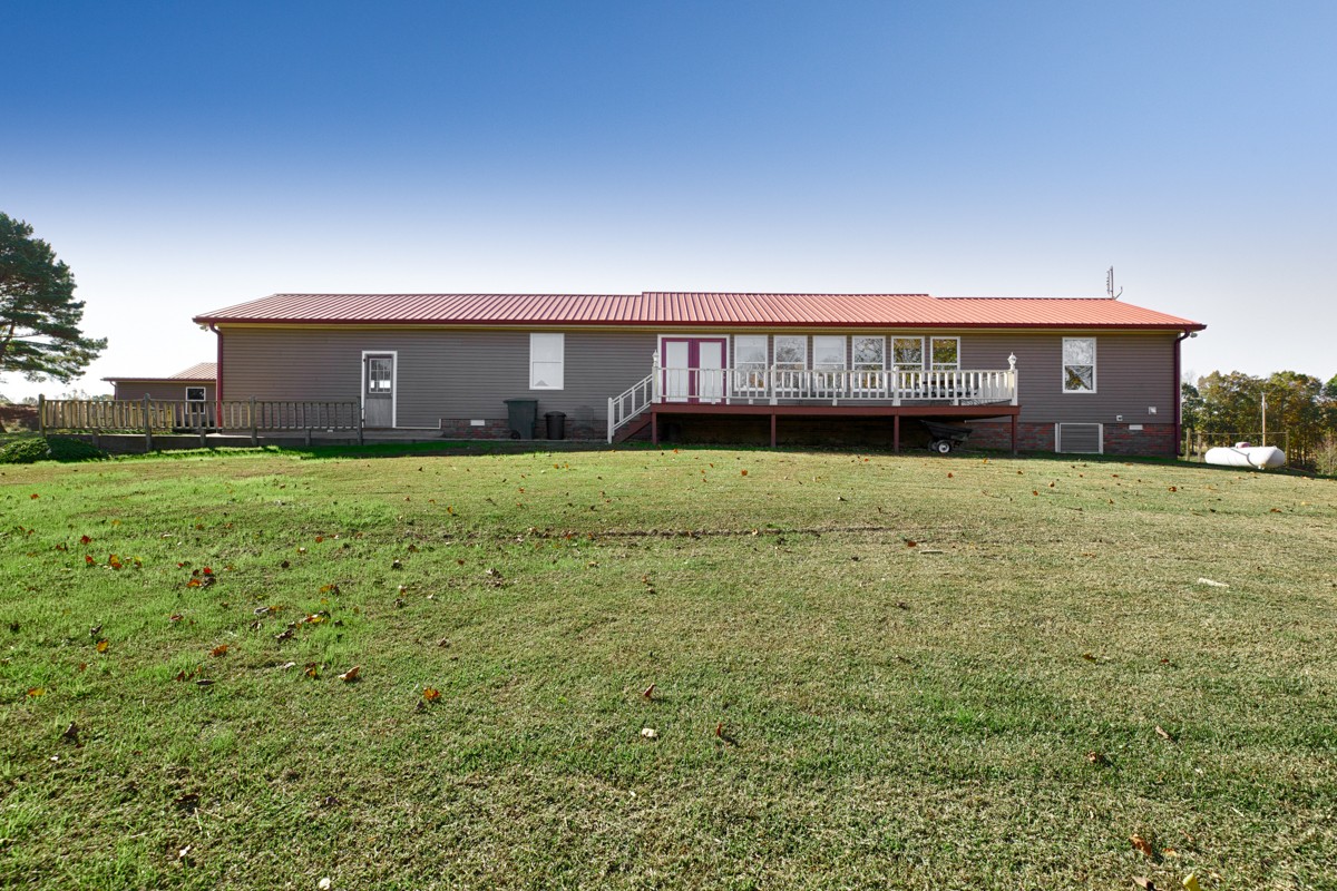1997 Nancy Green Ridge Road Prospect, TN 38477 - Photo 22 of 25 a view of a house with yard and sitting area
