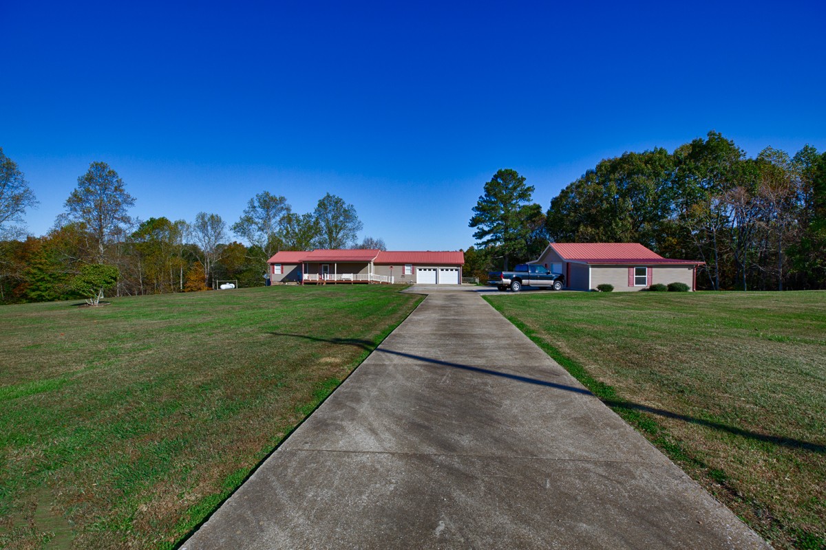 1997 Nancy Green Ridge Road Prospect, TN 38477 - Photo 25 of 25 a view of a white house with a yard