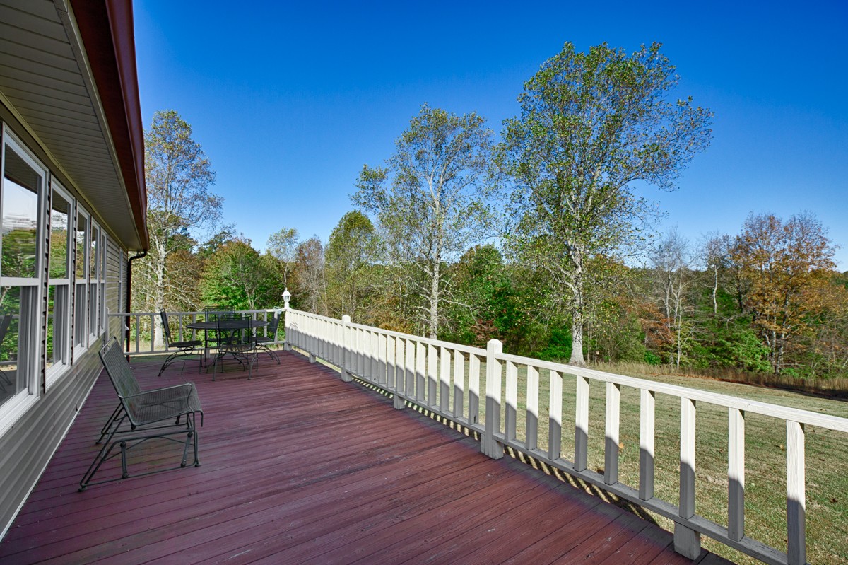 1997 Nancy Green Ridge Road Prospect, TN 38477 - Photo 4 of 25 a view of a deck with a backyard