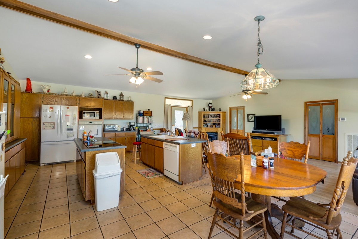 1997 Nancy Green Ridge Road Prospect, TN 38477 - Photo 7 of 25 a dining room filled a chandelier and kitchen view