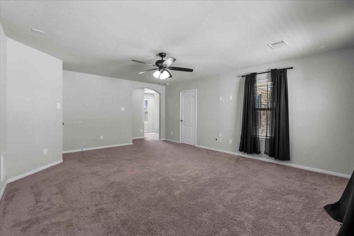 5111 Bay Lane Bacliff, TX 77518 - Photo 26 of 37 wooden floor in an empty room with a window