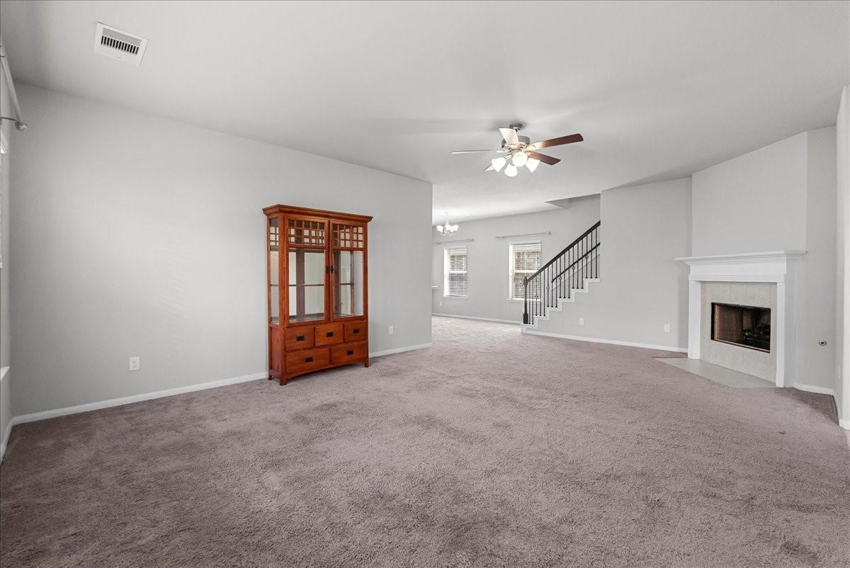 5111 Bay Lane Bacliff, TX 77518 - Photo 5 of 37 a view of empty room with fireplace and fan