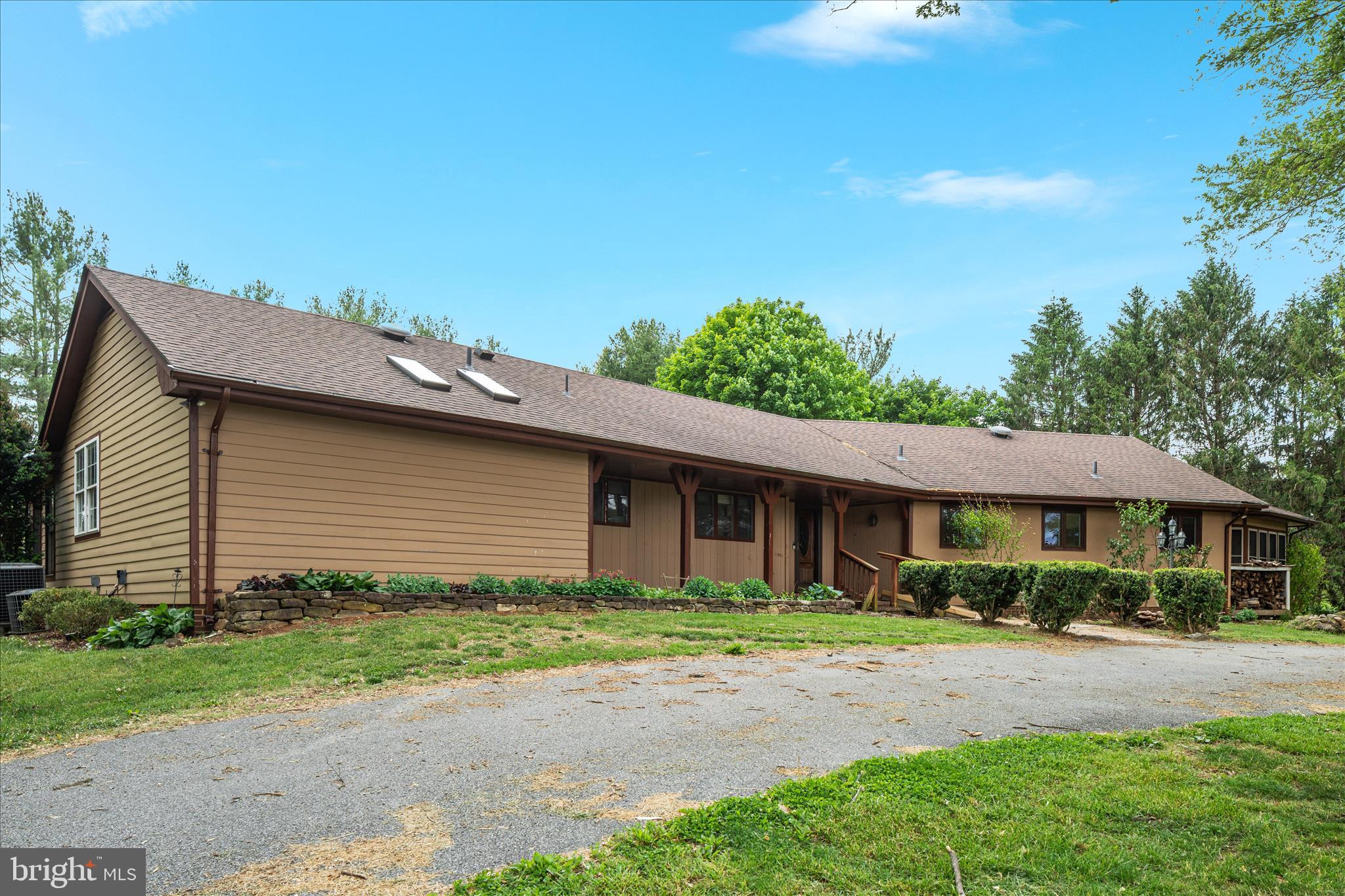 263 Bowling Green Road Front Royal, VA 22630 - Photo 2 of 75 a front view of a house with a yard