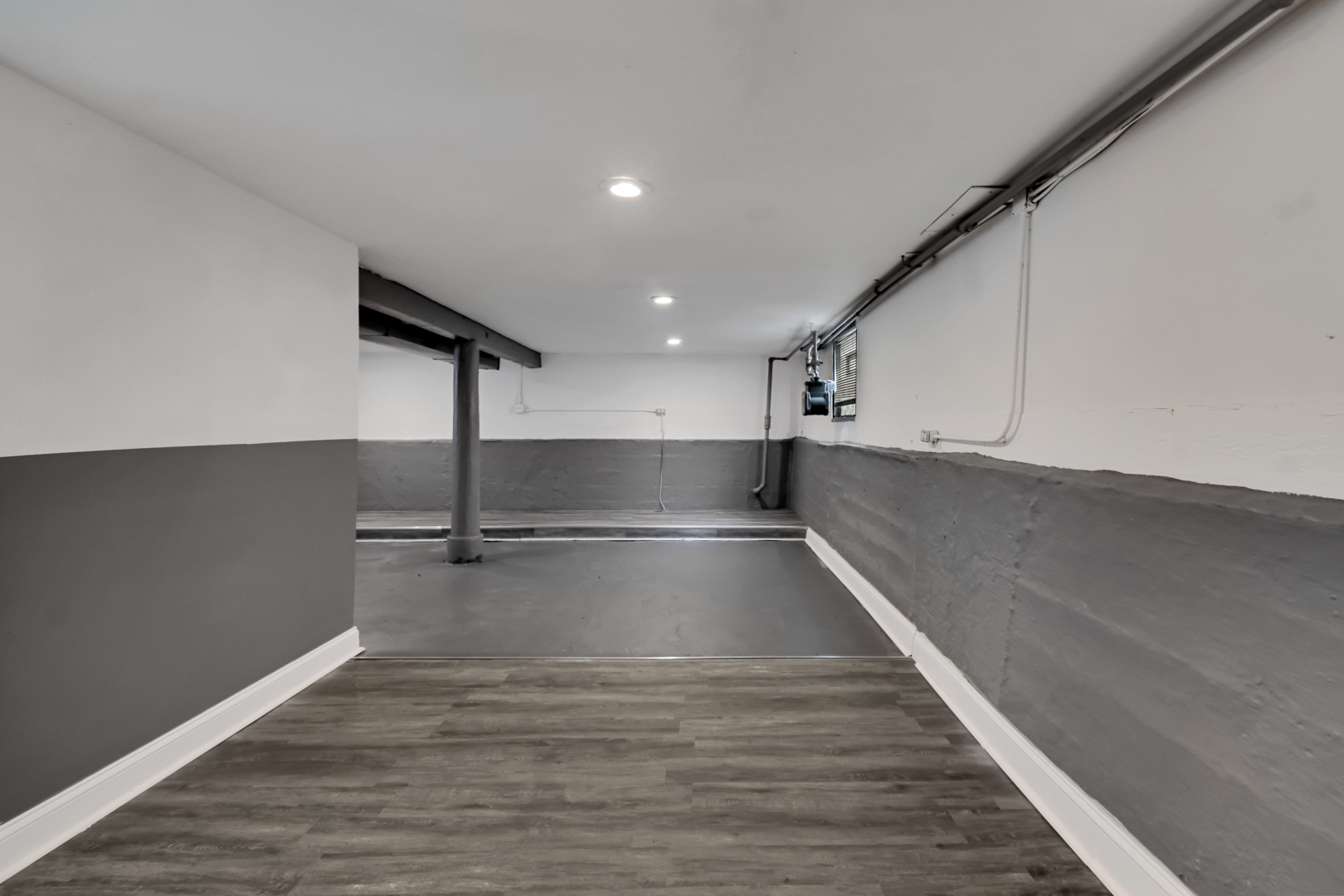 1011 West 103rd Place Chicago, IL 60643 - Photo 17 of 22 a view of a room with an empty space and a window