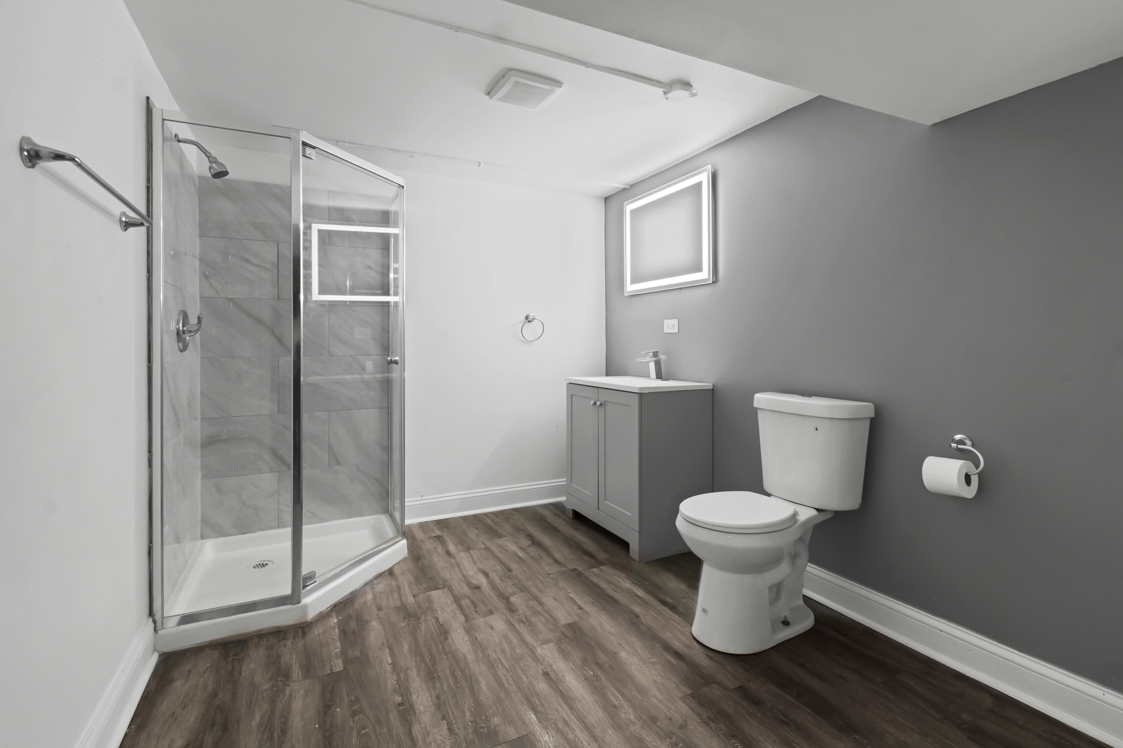 1011 West 103rd Place Chicago, IL 60643 - Photo 18 of 22 a bathroom with a toilet and a shower