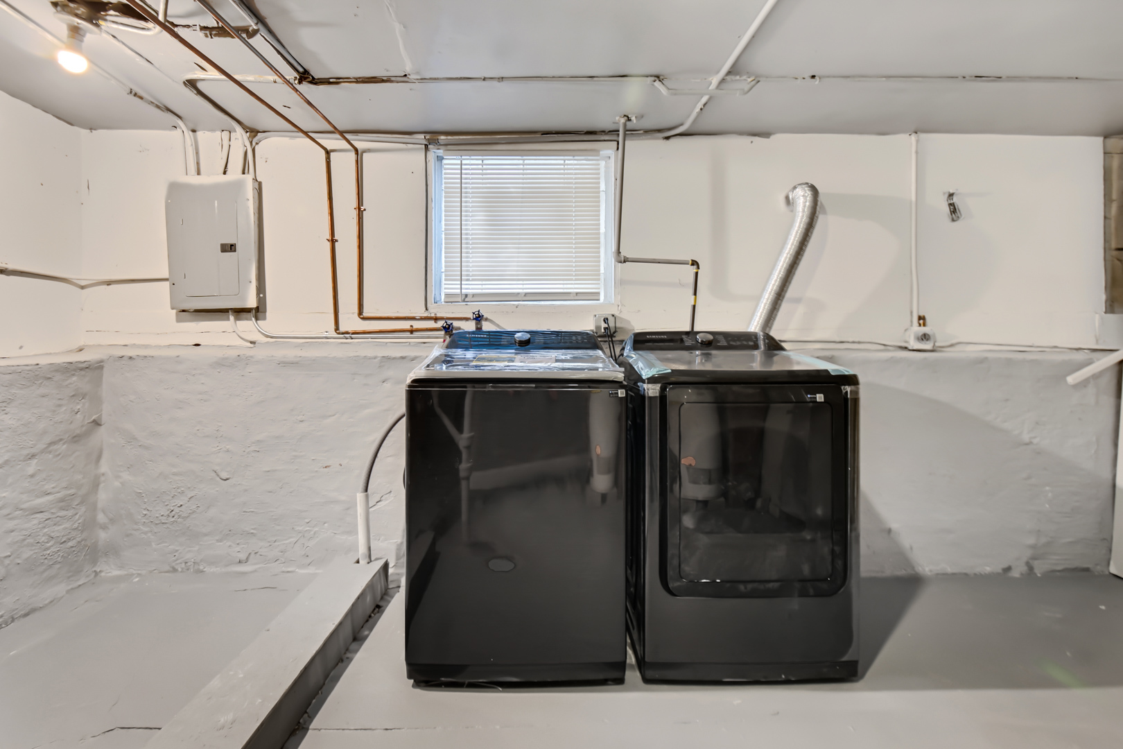 1011 West 103rd Place Chicago, IL 60643 - Photo 19 of 22 a bathroom with a granite countertop sink a mirror and a bathtub
