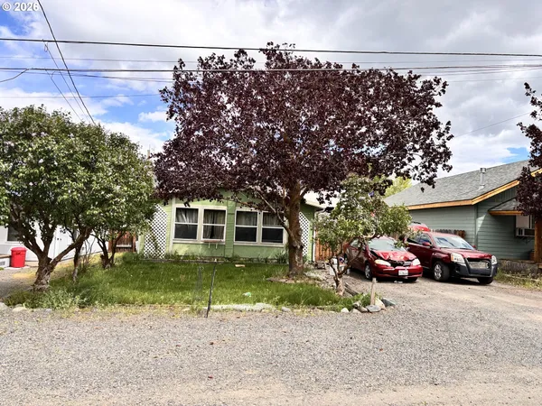 a car parked in front of a house