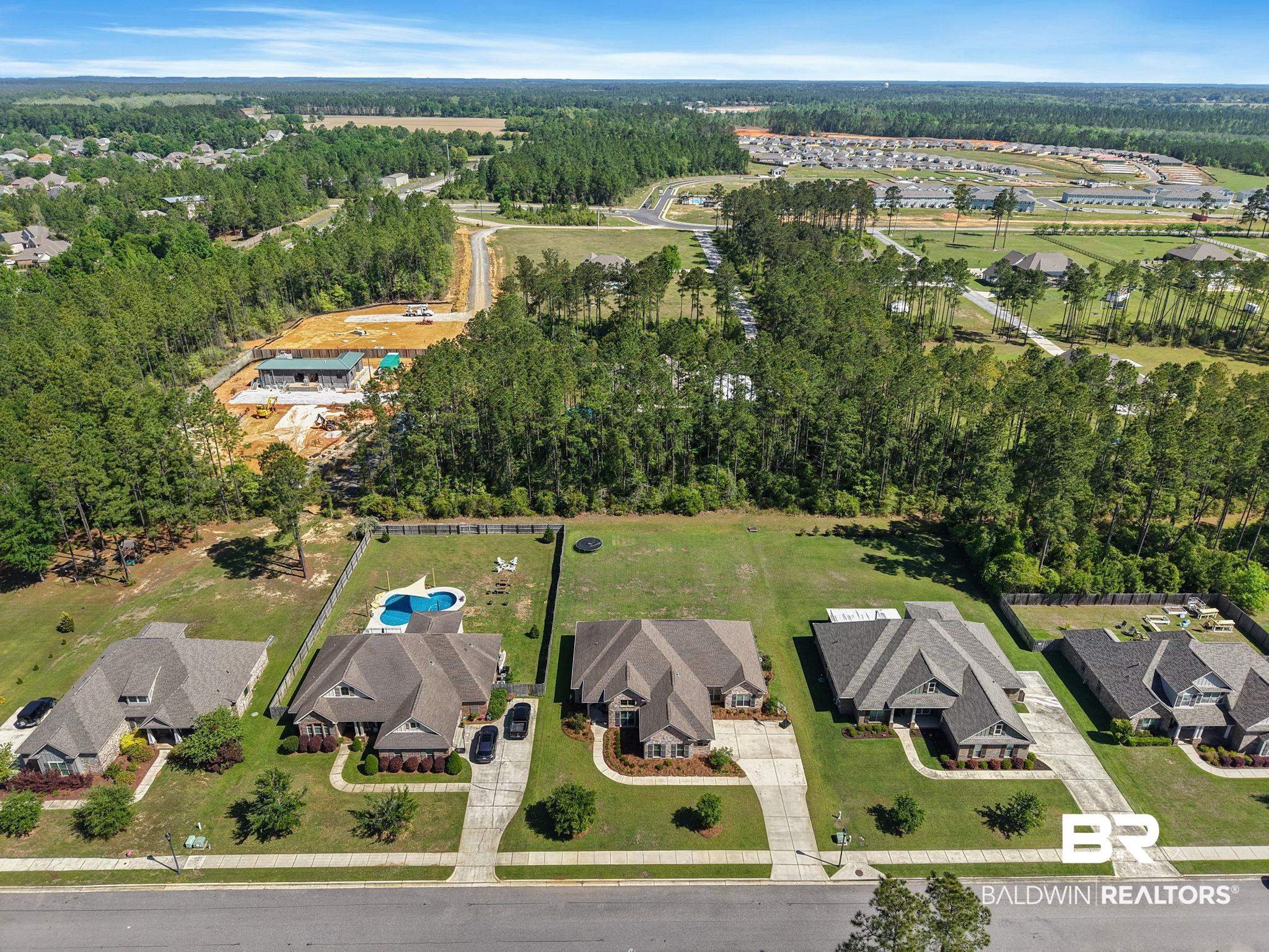 31911 Bobwhite Road Daphne, AL 36527 - Photo 66 of 85 Aerial view of property and surrounding area with nearby suburban area