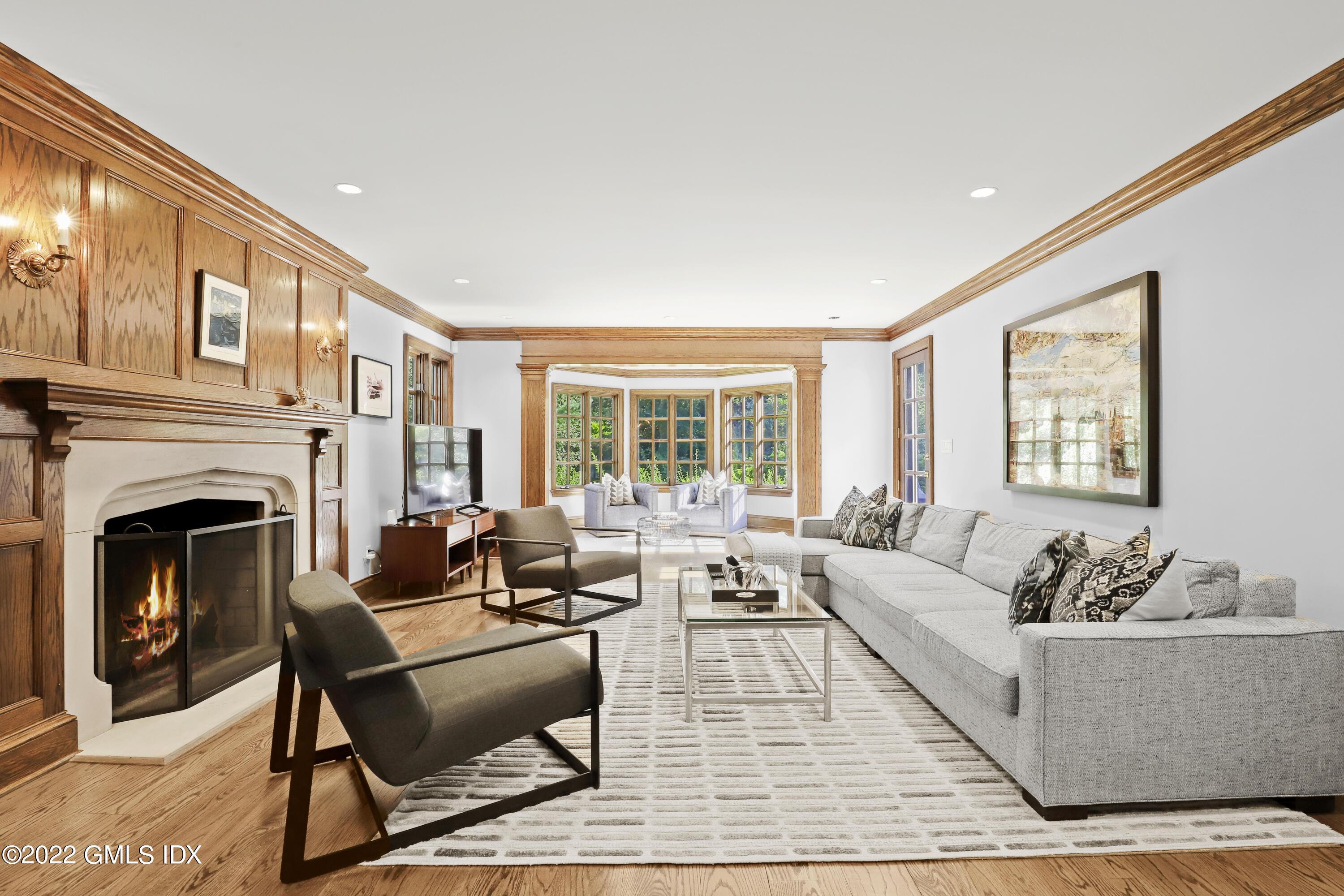 120 Dingletown Road Greenwich, CT 06830 - Photo 13 of 46 a living room with furniture and a fireplace