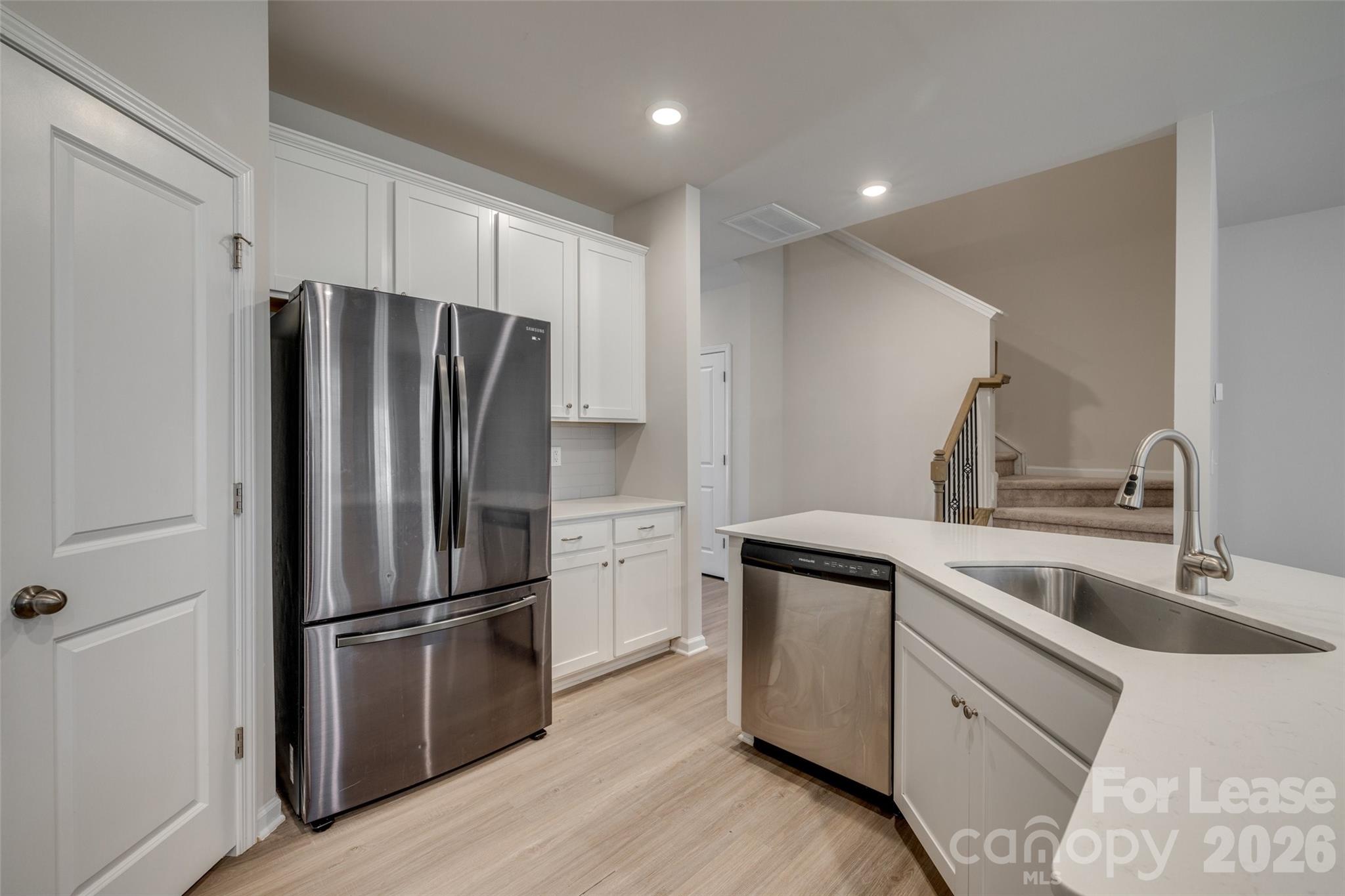 807 Gable Oak Lane Fort Mill, SC 29708 - Photo 6 of 39 a kitchen with a refrigerator sink and microwave