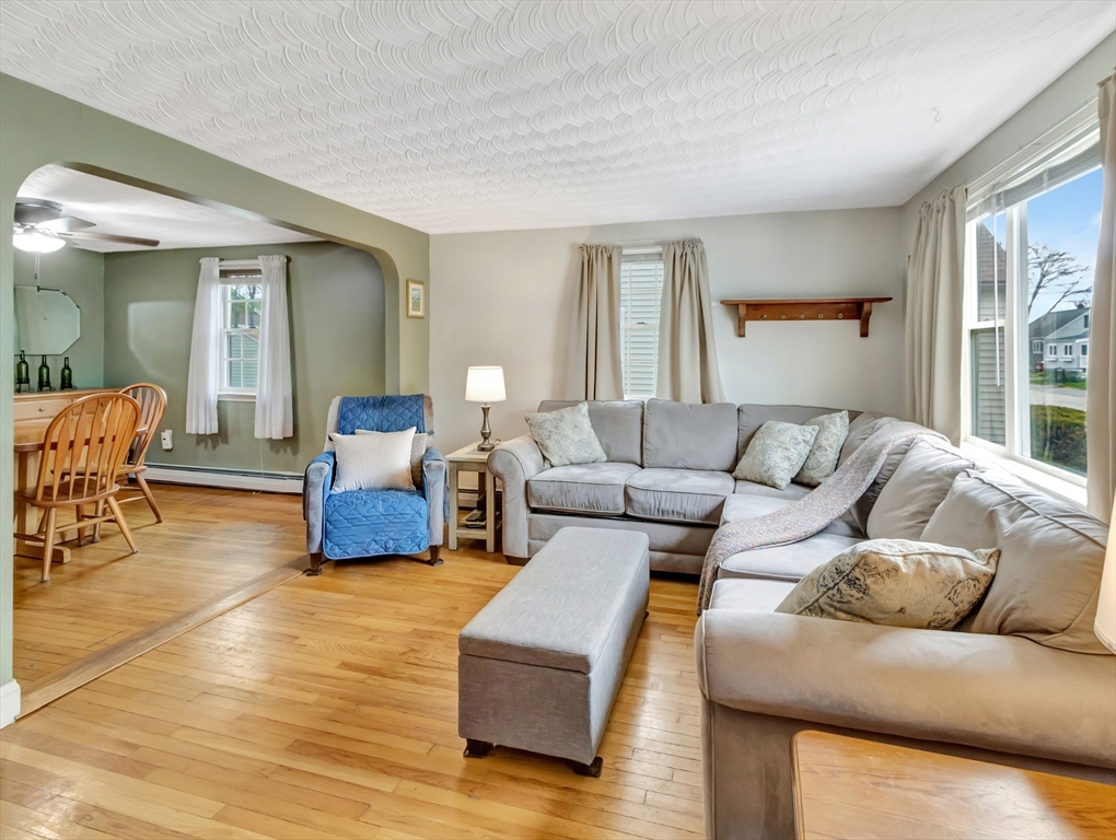 5 G Street Hull, MA 02045 - Photo 11 of 41 a living room with furniture and wooden floor