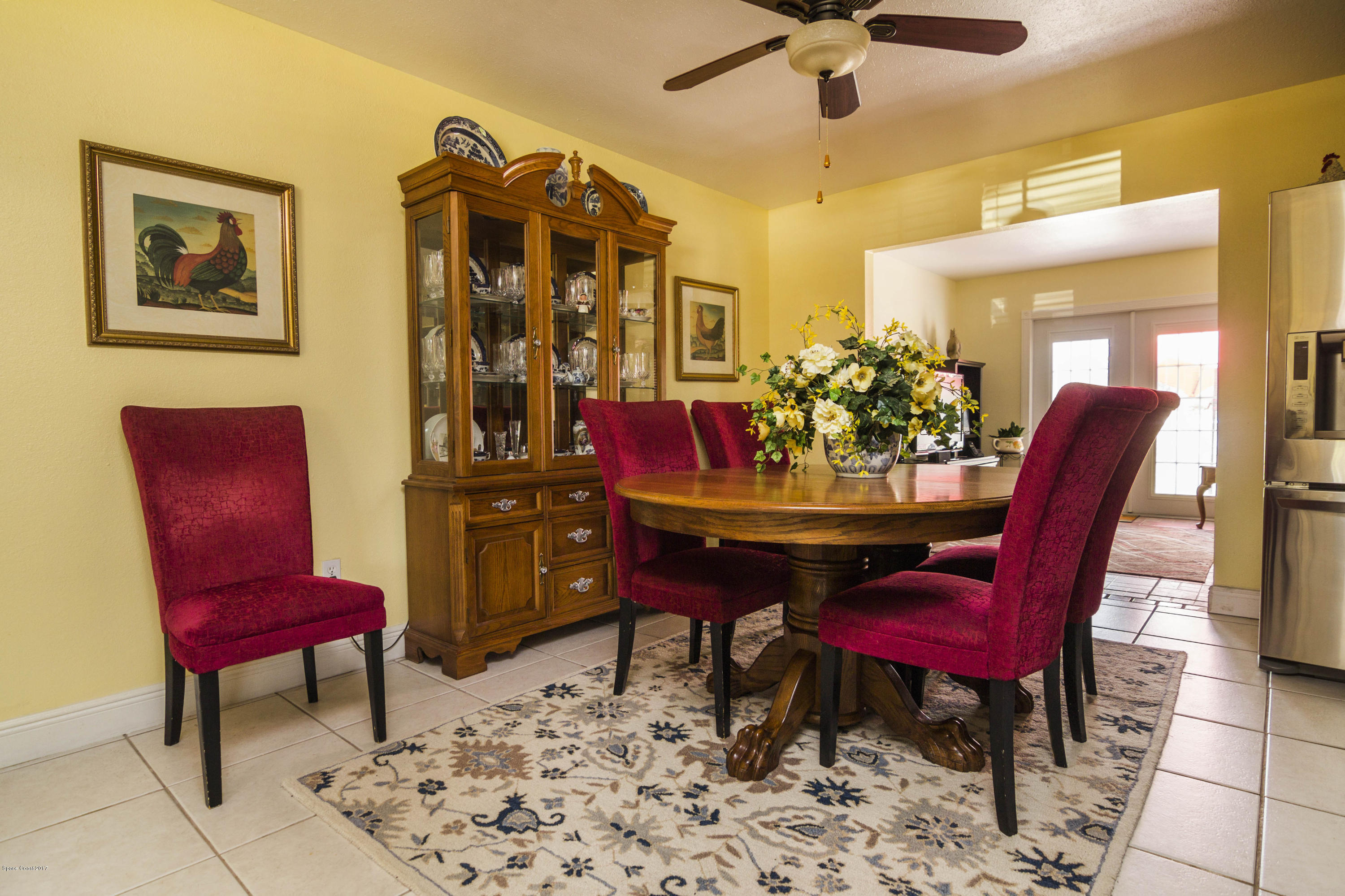 905 Riviera Drive Northeast Palm Bay, FL 32905 - Photo 3 of 21 a view of a dining room with furniture