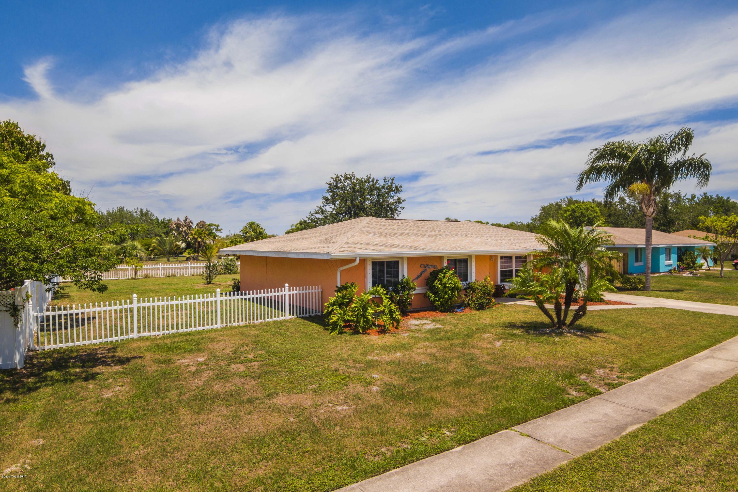 905 Riviera Drive Northeast Palm Bay, FL 32905 - Photo 21 of 21 swimming pool with outdoor seating