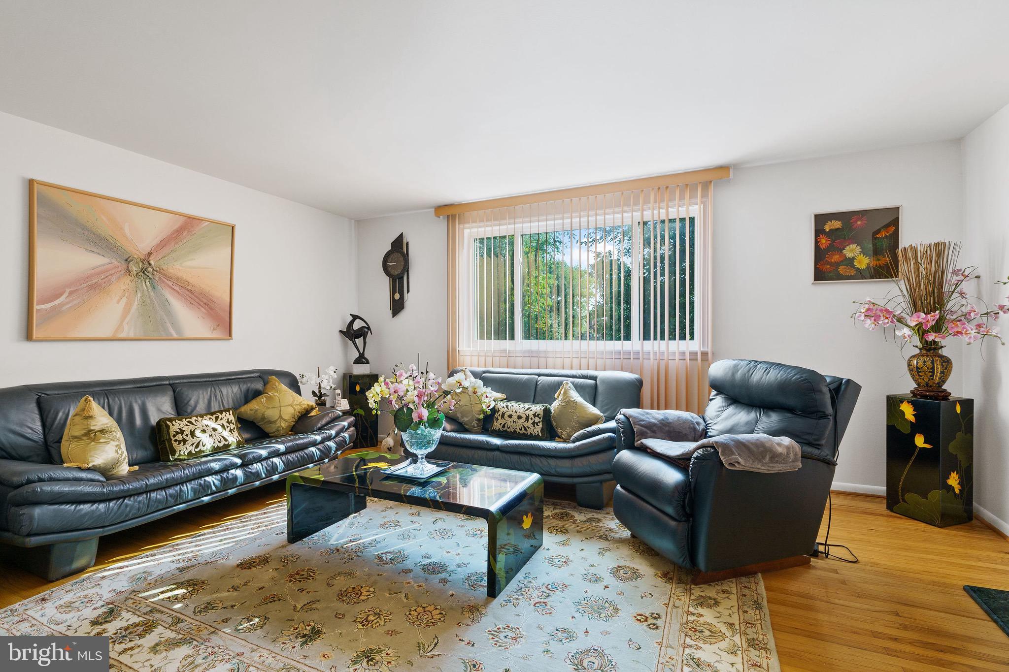 1122 Surrey Road Philadelphia, PA 19115 - Photo 10 of 29 a living room with furniture and a window