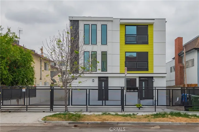 a front view of building with street