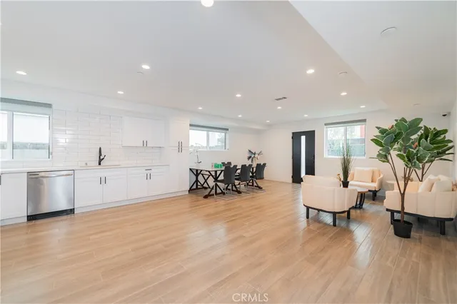 a view of a living room and dining room