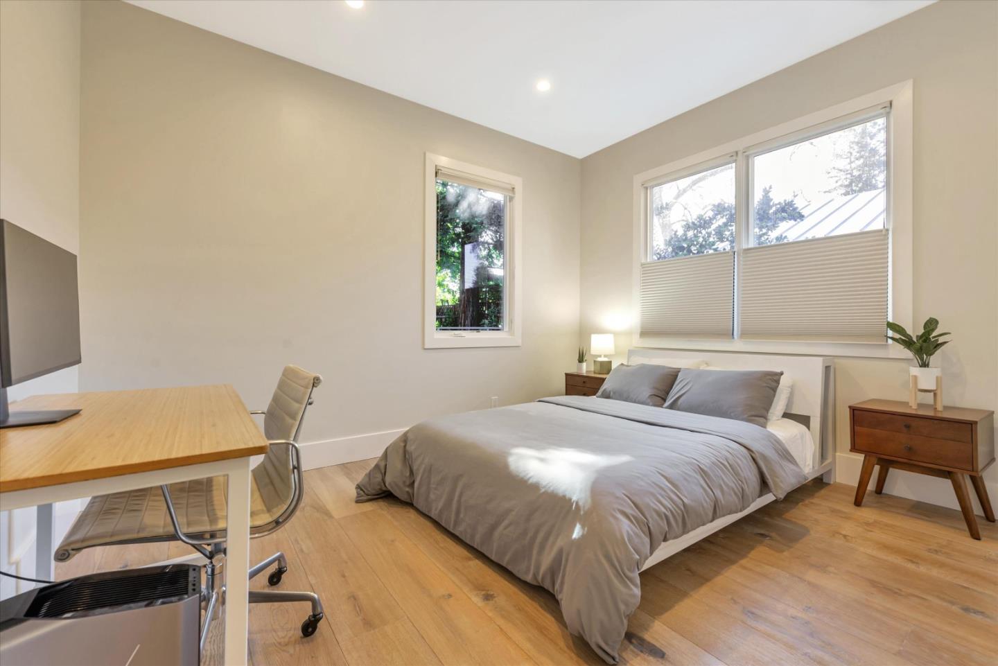 455 San Mateo Drive Menlo Park, CA 94025 - Photo 17 of 37 a bedroom with a bed and a desk