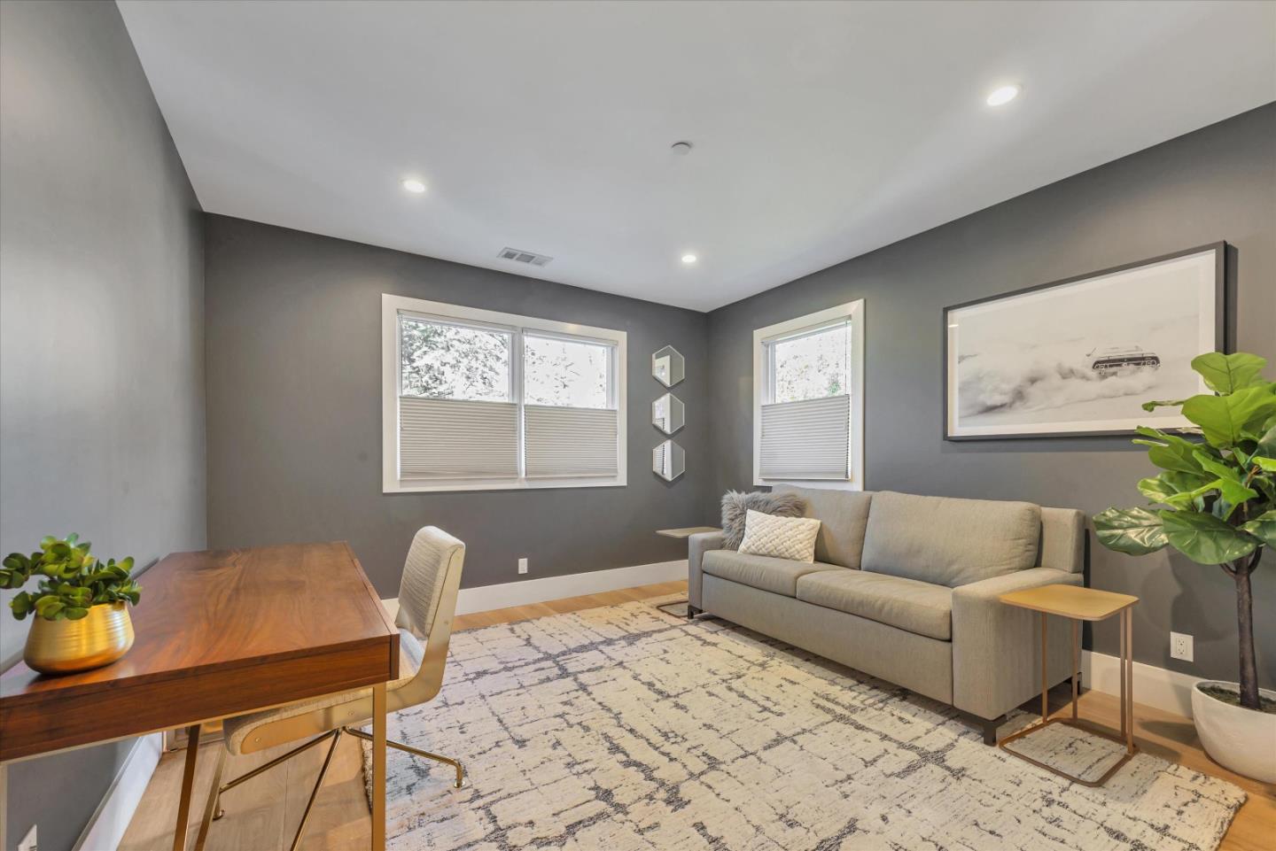 455 San Mateo Drive Menlo Park, CA 94025 - Photo 20 of 37 a living room with furniture and a potted plant