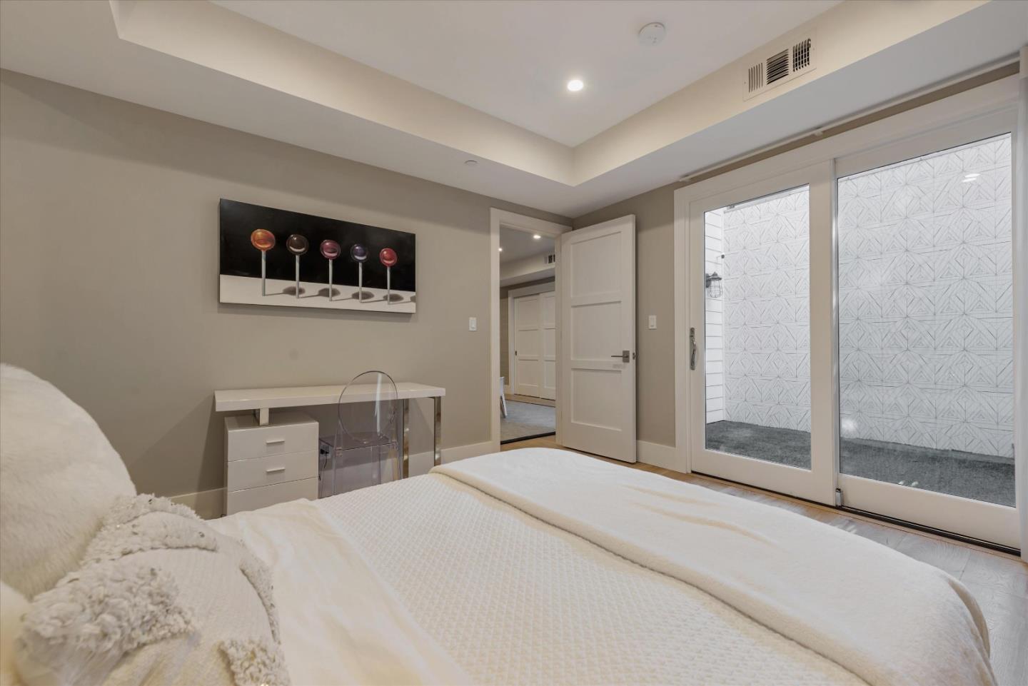 455 San Mateo Drive Menlo Park, CA 94025 - Photo 26 of 37 a bedroom with a bed and a dresser