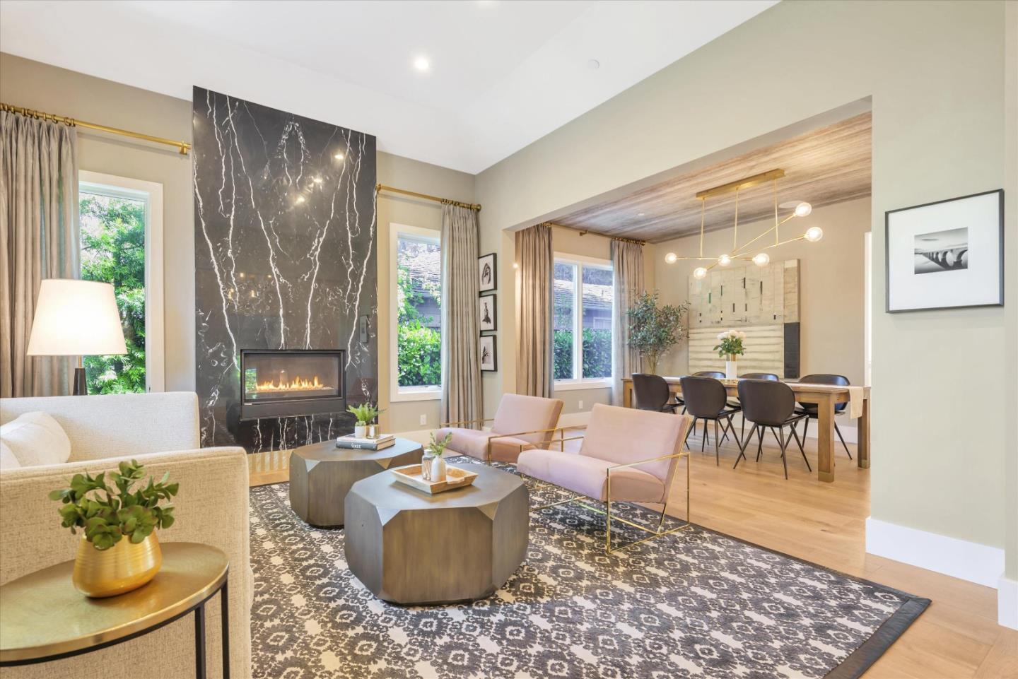 455 San Mateo Drive Menlo Park, CA 94025 - Photo 3 of 37 a living room with furniture and a potted plant