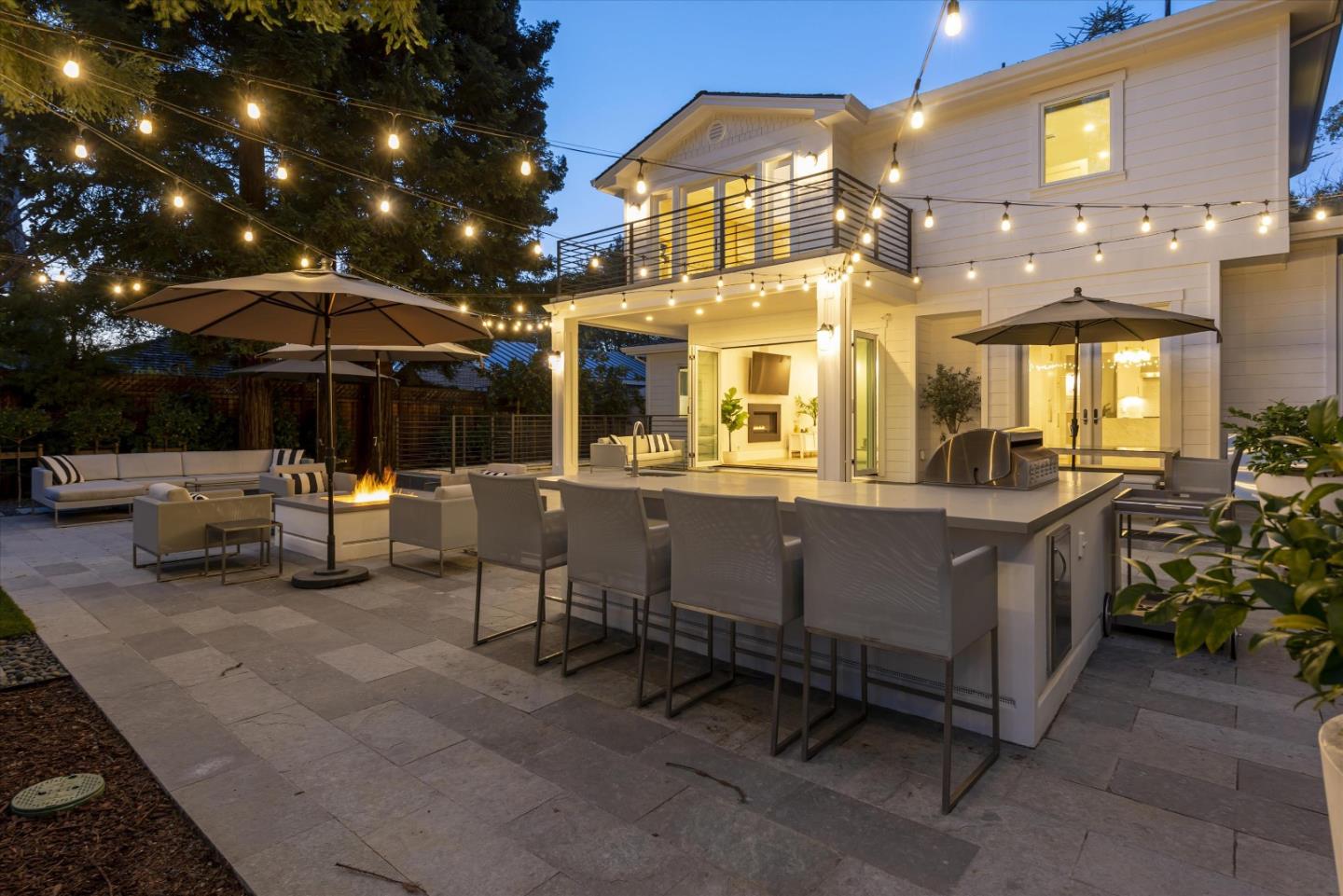 455 San Mateo Drive Menlo Park, CA 94025 - Photo 36 of 37 a view of a patio with dining table and chairs