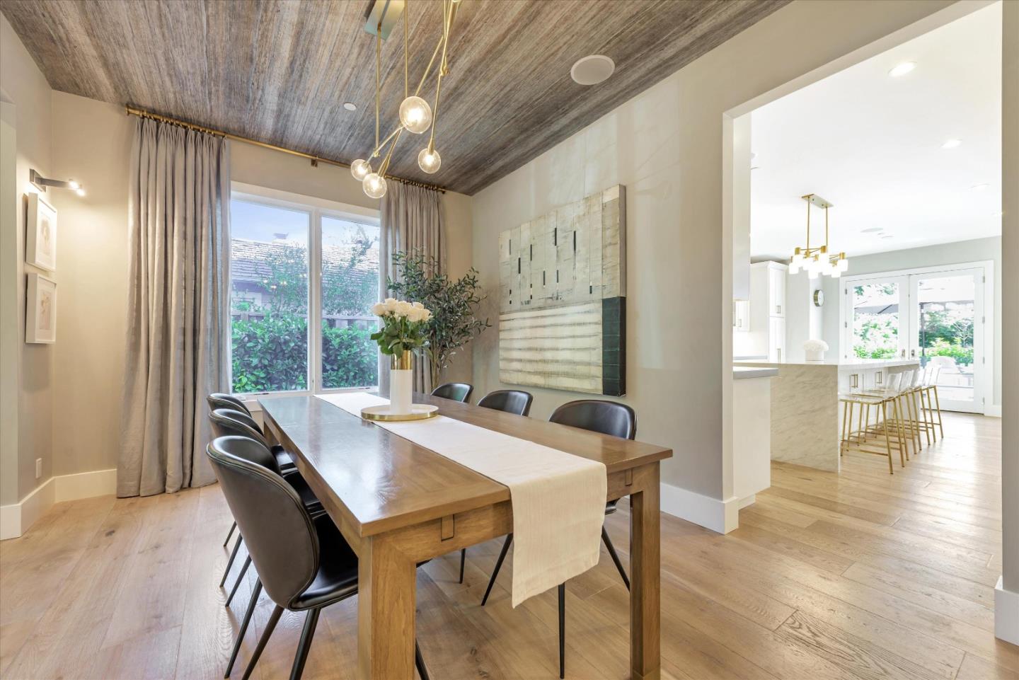 455 San Mateo Drive Menlo Park, CA 94025 - Photo 7 of 37 a view of a dining room with furniture window and wooden floor