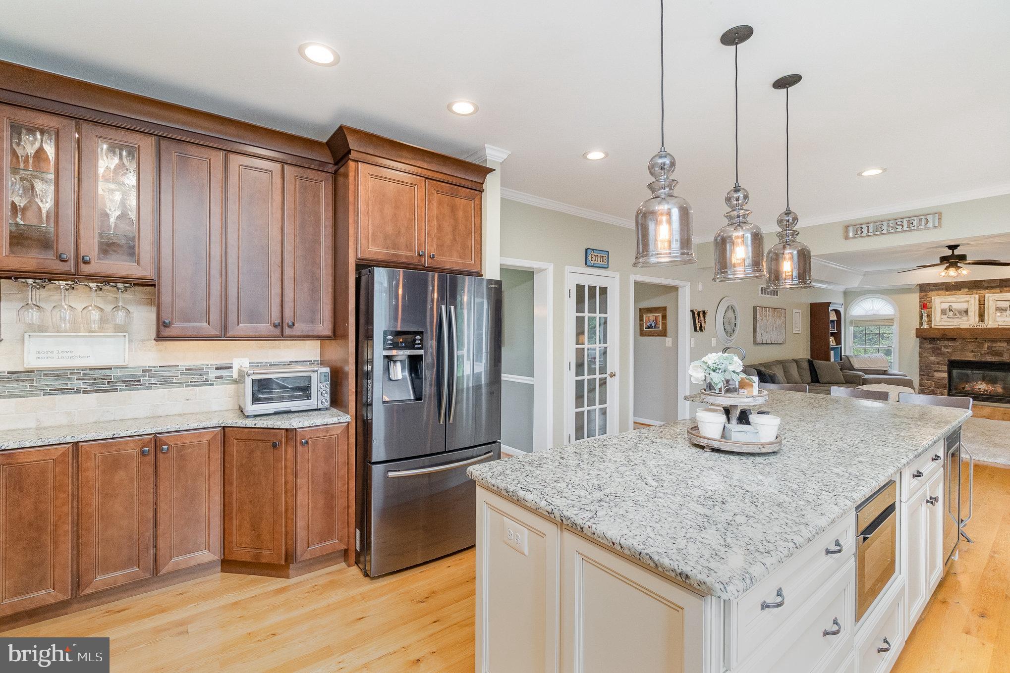 523 Copeland Road Fallston, MD 21047 - Photo 23 of 72 a kitchen with stainless steel appliances granite countertop a sink refrigerator and cabinets