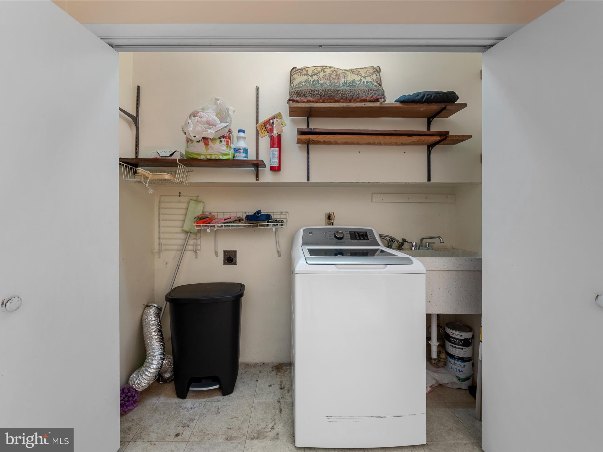 128 Longcroft Road Winchester, VA 22602 - Photo 18 of 41 a utility room with cabinets