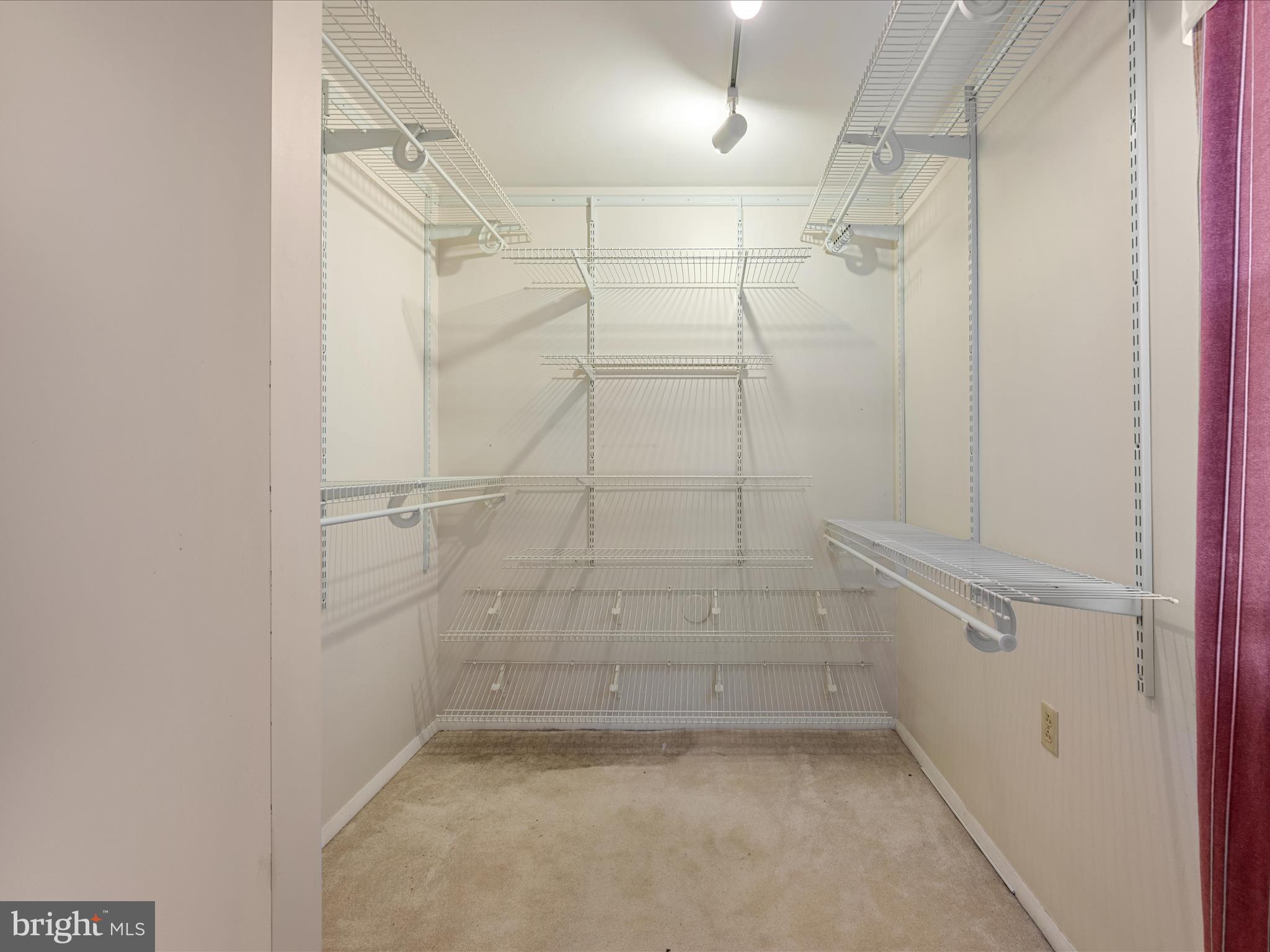 128 Longcroft Road Winchester, VA 22602 - Photo 23 of 41 a view of a room with racks on the wall