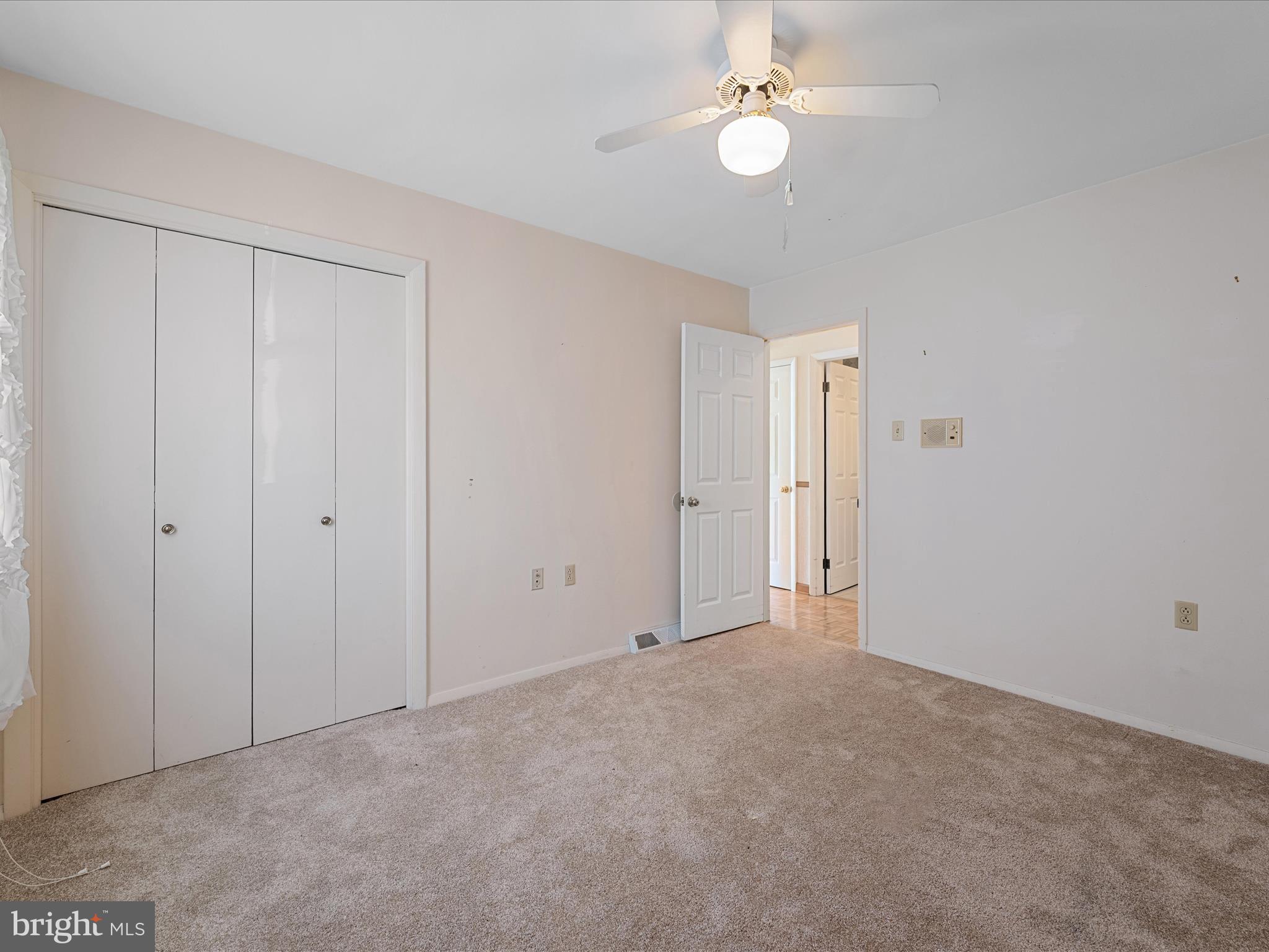 128 Longcroft Road Winchester, VA 22602 - Photo 30 of 41 a view of an empty room with a ceiling fan