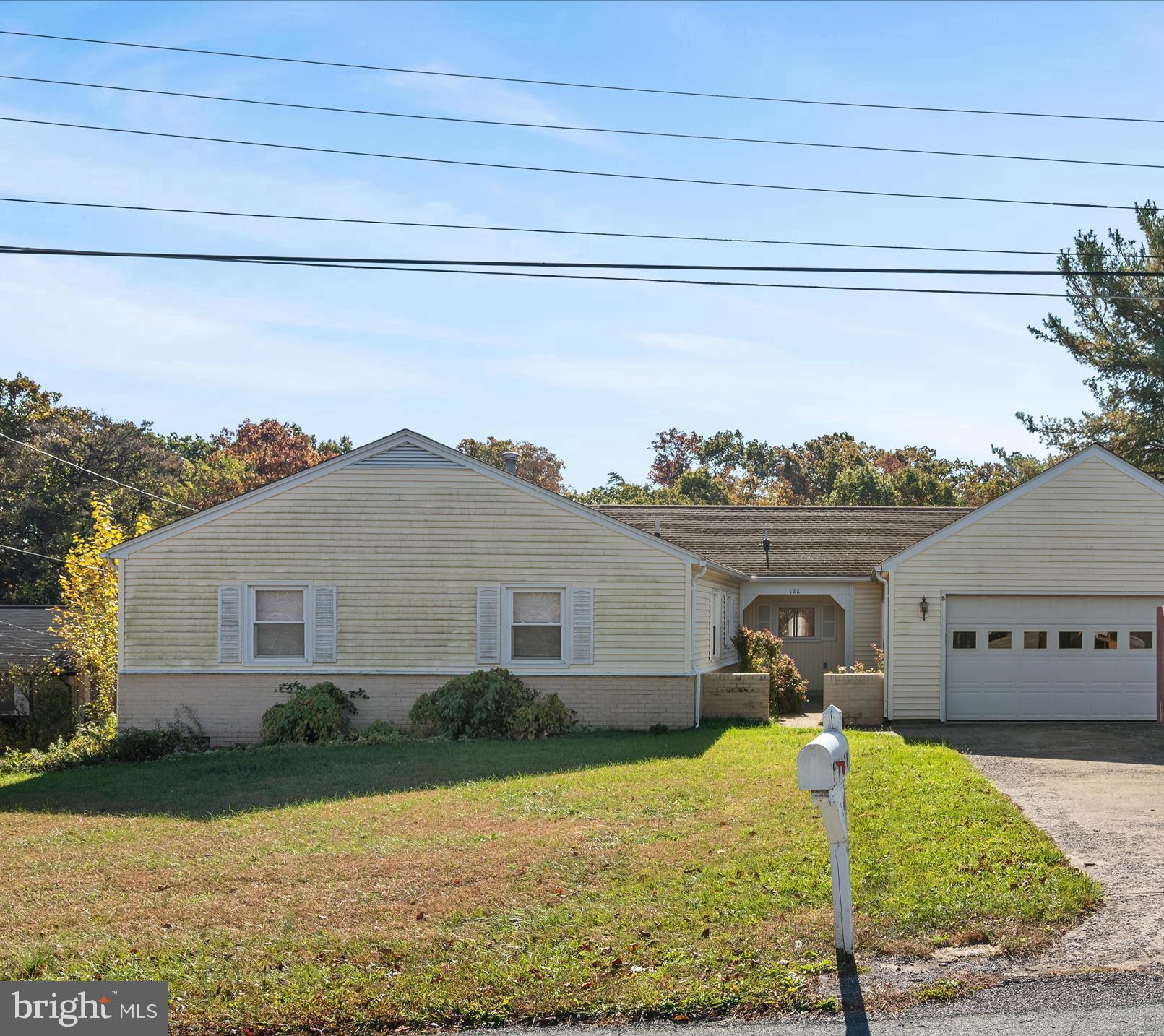 128 Longcroft Road Winchester, VA 22602 - Photo 32 of 41 a view of a house with a yard
