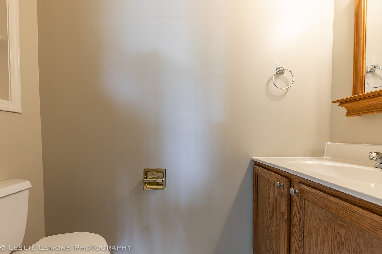 956 Pin Oak Circle Cary, IL 60013 - Photo 15 of 31 a bathroom with a sink mirror vanity and toilet
